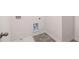 Neat laundry room featuring tile flooring and essential utility hookups for efficient home maintenance at 637 Kimberwick Dr, Locust Grove, GA 30248
