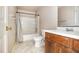 Bathroom featuring a bathtub and wood vanity at 9066 Bob Jackson Dr, Jonesboro, GA 30238