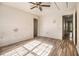 Bedroom with laminate floor and ceiling fan at 9066 Bob Jackson Dr, Jonesboro, GA 30238