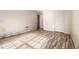 Empty bedroom with laminate floors and doorway at 9066 Bob Jackson Dr, Jonesboro, GA 30238