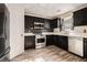 Well-equipped kitchen with stainless steel appliances and modern touches is ready to cook at 9066 Bob Jackson Dr, Jonesboro, GA 30238
