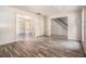 A spacious living room showing access to stairs and dining area at 9066 Bob Jackson Dr, Jonesboro, GA 30238