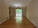 Bright dining area featuring hardwood floors and sliding glass doors leading to a deck at 2685 Hyde Cir, Duluth, GA 30096
