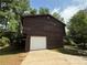 View of the rear exterior and garage at 2685 Hyde Cir, Duluth, GA 30096