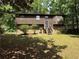 Charming two-story home with a stone facade and a cozy front yard with mature trees at 2685 Hyde Cir, Duluth, GA 30096