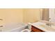 Bathroom featuring a shower-tub combo, a toilet, and a vanity with a sink at 275 Blue Pointe Ct, Suwanee, GA 30024