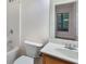 Bathroom featuring a shower-tub combo, a toilet, and a vanity with a sink at 275 Blue Pointe Ct, Suwanee, GA 30024