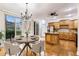 Light filled dining area featuring sliding glass doors and views of the outdoor space at 275 Blue Pointe Ct, Suwanee, GA 30024