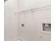 Laundry room featuring washer and dryer hookups, with shelving at 275 Blue Pointe Ct, Suwanee, GA 30024
