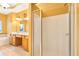 Modern main bathroom featuring a glass-enclosed shower and soaking tub at 275 Blue Pointe Ct, Suwanee, GA 30024