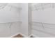 Spacious walk-in closet with wire shelving and ample storage for an organized wardrobe at 275 Blue Pointe Ct, Suwanee, GA 30024