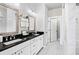 Bright bathroom with double vanity, granite countertops, and a separate shower for added convenience at 3786 Alstead Manor Way, Suwanee, GA 30024