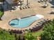 Community pool with mushroom water feature at 3786 Alstead Manor Way, Suwanee, GA 30024
