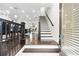 Inviting foyer featuring hardwood floors, staircase, and an open view of the home's interior at 3786 Alstead Manor Way, Suwanee, GA 30024