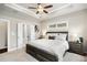 Comfortable bedroom features soft carpet, and natural light through the large window at 3786 Alstead Manor Way, Suwanee, GA 30024