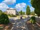 Serene park view with sculpture, seating, and lush greenery at 3786 Alstead Manor Way, Suwanee, GA 30024