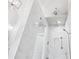 Luxurious marble walk-in shower featuring dual shower heads and a contemporary design at 3786 Alstead Manor Way, Suwanee, GA 30024
