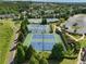 Beautiful tennis courts with mature trees and landscaping, near the community clubhouse and parking at 3786 Alstead Manor Way, Suwanee, GA 30024