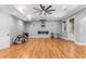 Spacious basement offers wood flooring, recessed lighting, and a modern fireplace at 504 S Westminster Ne Way, Atlanta, GA 30307