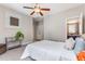 Bedroom features soft natural lighting, light gray walls, and ensuite bathroom at 504 S Westminster Ne Way, Atlanta, GA 30307