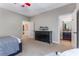 Bright bedroom features a dark wood dresser and neutral color palette at 504 S Westminster Ne Way, Atlanta, GA 30307