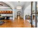 Grand foyer with hardwood floors, arched doorways, a round chandelier, and views into other rooms at 504 S Westminster Ne Way, Atlanta, GA 30307