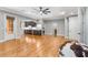 Open-concept living area with wood flooring, recessed lighting, and a connected kitchen at 504 S Westminster Ne Way, Atlanta, GA 30307