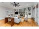 Inviting living room with built-in shelving, fireplace, and hardwood floors at 504 S Westminster Ne Way, Atlanta, GA 30307