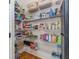 Pantry featuring wire shelving with an abundance of food storage items and storage containers at 504 S Westminster Ne Way, Atlanta, GA 30307