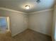 Neutral carpeted bedroom with white trim and natural light from the window at 937 Capitol View Nw Ave, Atlanta, GA 30318