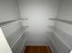 Spacious closet with multiple shelves, providing ample storage and organization options for clothing and accessories at 937 Capitol View Nw Ave, Atlanta, GA 30318