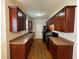 Functional kitchen with ample cabinetry, black appliances, and a well-lit space for cooking and meal preparation at 937 Capitol View Nw Ave, Atlanta, GA 30318