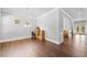 Open dining room featuring hardwood floors and ample natural light, perfect for Gathering gatherings at 132 Shellbark Dr, Mcdonough, GA 30252