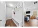 Mudroom with custom built-ins including shelving, hooks, and a bench for storage and organization at 132 Shellbark Dr, Mcdonough, GA 30252