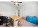 This room features a desk and filing cabinet with boxes and is suitable for a home office at 132 Shellbark Dr, Mcdonough, GA 30252