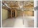 Unfinished basement space with exposed ductwork, wood framing, and concrete floor at 1610 Niskey Lake Rd, Atlanta, GA 30331