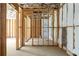 Partially insulated basement shows framing for future rooms and utility access points at 1610 Niskey Lake Rd, Atlanta, GA 30331