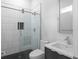 Bathroom featuring a glass-enclosed shower, a gray vanity, and a clean white toilet at 1610 Niskey Lake Rd, Atlanta, GA 30331