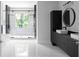 Sleek bathroom featuring a glass shower, modern vanity, and stylish fixtures at 1610 Niskey Lake Rd, Atlanta, GA 30331