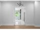 Open view into a modern bathroom featuring a sleek glass shower and bright natural light at 1610 Niskey Lake Rd, Atlanta, GA 30331