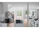 Open foyer with light-filled windows and a contemporary staircase at 1610 Niskey Lake Rd, Atlanta, GA 30331