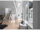 Grand foyer featuring high ceilings, hardwood floors, a modern staircase, and large windows that flood the space with light at 1610 Niskey Lake Rd, Atlanta, GA 30331