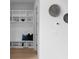 Hallway with custom built-in shelving and herringbone detailing that adds character to the home at 1610 Niskey Lake Rd, Atlanta, GA 30331