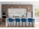 Open kitchen boasts an island with breakfast bar, stainless appliances, and plenty of cabinet space at 1610 Niskey Lake Rd, Atlanta, GA 30331