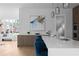 Open kitchen includes stainless steel faucet, an oversized island, and decorative lighting fixtures at 1610 Niskey Lake Rd, Atlanta, GA 30331