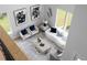 Bright, open living room features modern décor, art and furniture, with large windows for natural light at 1610 Niskey Lake Rd, Atlanta, GA 30331