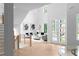 Elegant living room with high ceilings, hardwood floors, and large windows, showcasing modern decor and an open layout at 1610 Niskey Lake Rd, Atlanta, GA 30331