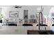 Bright, open concept living area with modern decor, a fireplace, and lots of natural light at 1610 Niskey Lake Rd, Atlanta, GA 30331