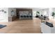 Open-concept living space featuring kitchen island, dining area, and comfortable seating for seamless entertaining at 1610 Niskey Lake Rd, Atlanta, GA 30331
