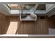 Sun-filled loft with hardwood floors, skylight, and a comfortable couch at 1610 Niskey Lake Rd, Atlanta, GA 30331